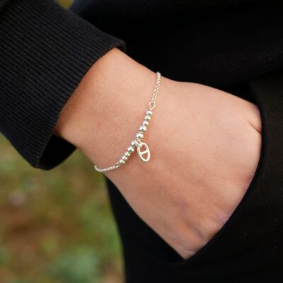 Pulsera de cadena y perlas con colgante