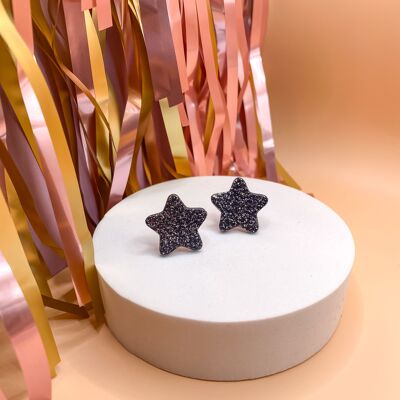 Star stud earrings in black glitter leather
