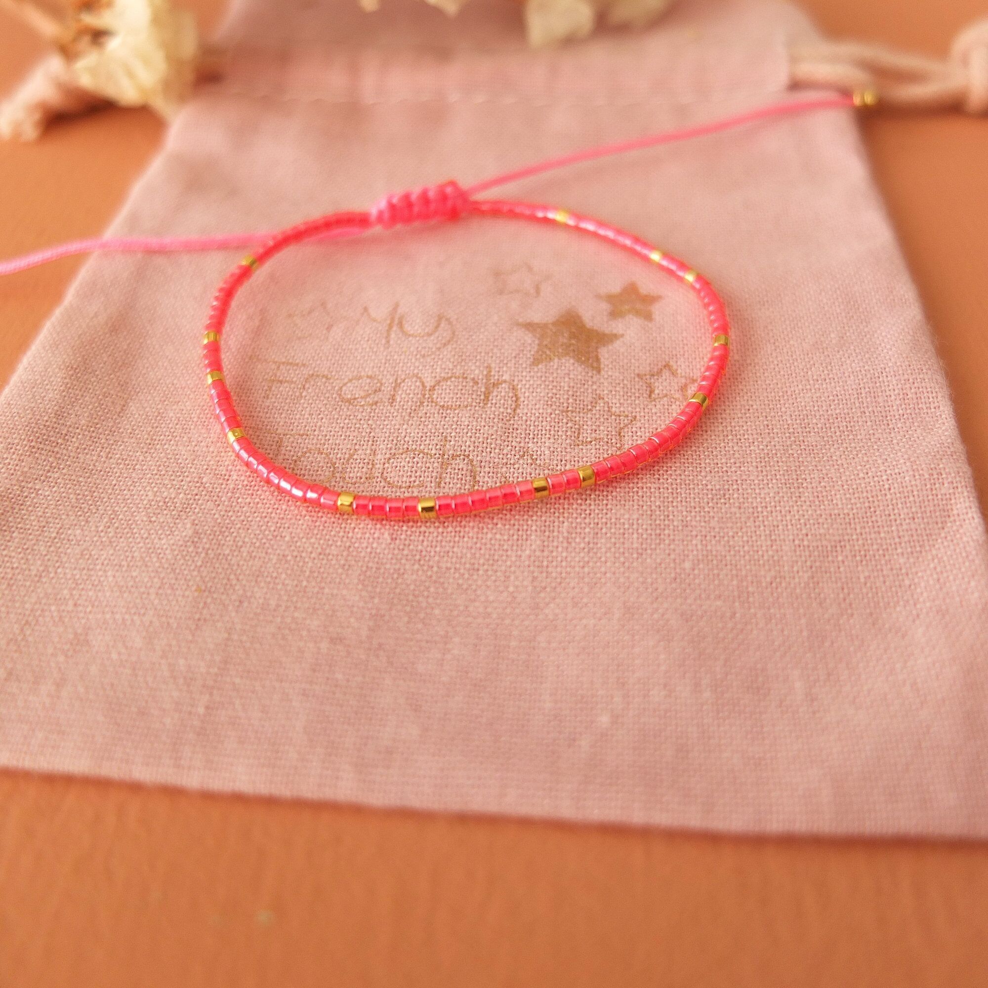 Bracciale regolabile in filo di giada e perle miyuki lucide