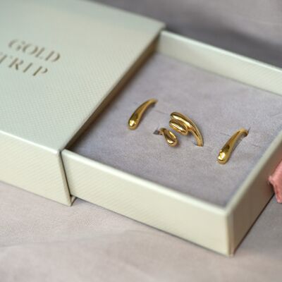 Set de regalo de aretes y anillo con forma de gota de agua
