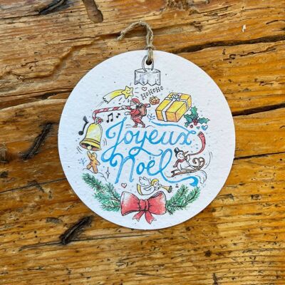 Tarjeta de felicitación con semillas para plantar una bola navideña redonda.