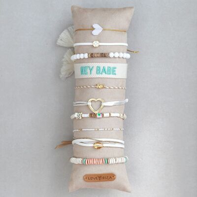 Display cushion with 10 white bracelets