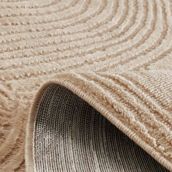 Tapis poils ras motif abstrait en relief beige 3