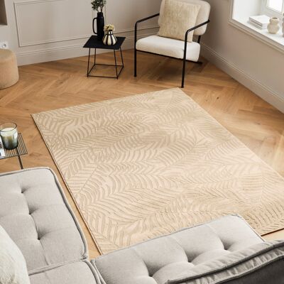 Short pile carpet with embossed leaf pattern beige