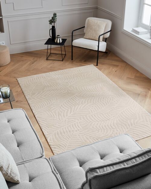 Tapis poils ras motif feuille en relief crème