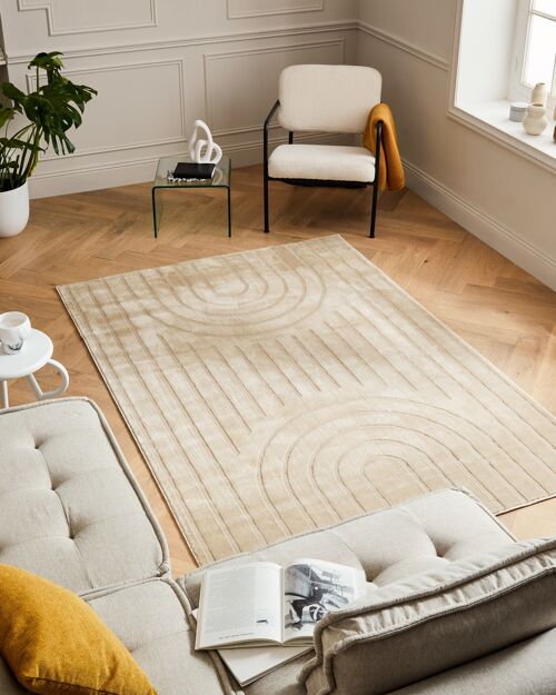 Tapis poils ras motif arc de cercle en relief beige