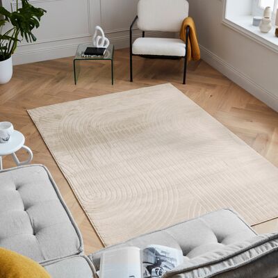 Low pile rug with half arc pattern in cream relief