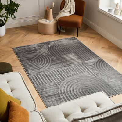 Low pile rug geometric pattern in gray relief