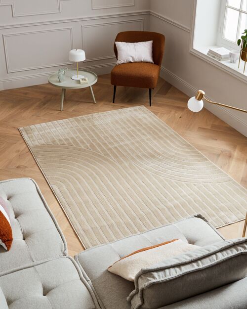 Tapis poils ras motif en relief beige