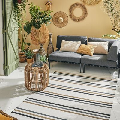 Outdoor rug with black striped patterns