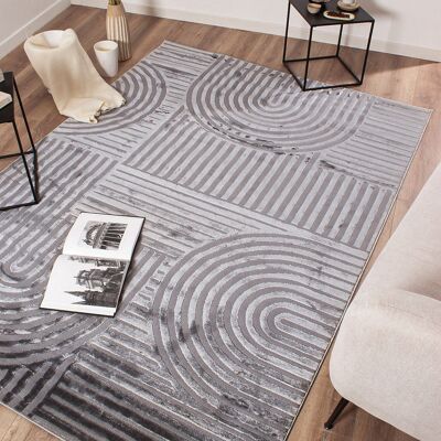 Tapis motif en relief gris