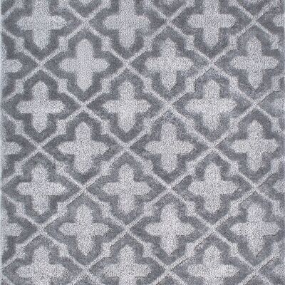 Alfombra gris con motivos geométricos