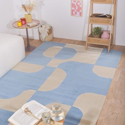 Short pile living room rug with blue graphic pattern