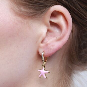 Boucles d'oreilles dorées étoile de mer rose 2