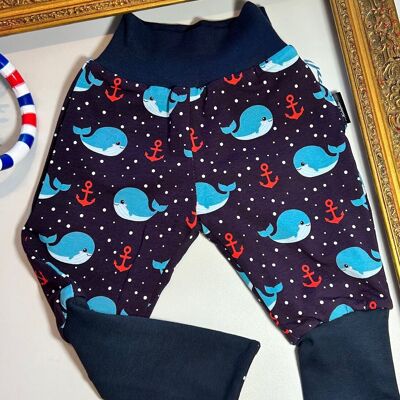 Reversible dark blue trousers with cute whales