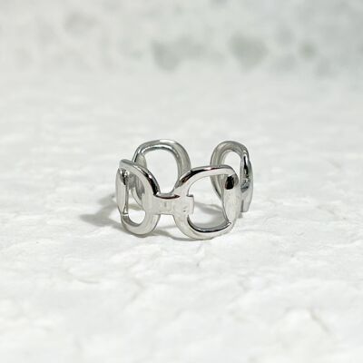 Anillo de plata ajustable con múltiples círculos.