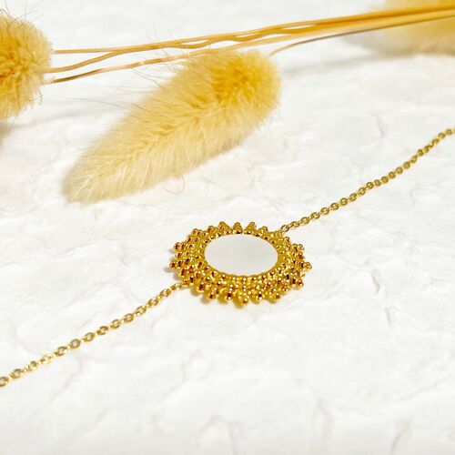 Bracelet chaîne dorée avec soleil nacre