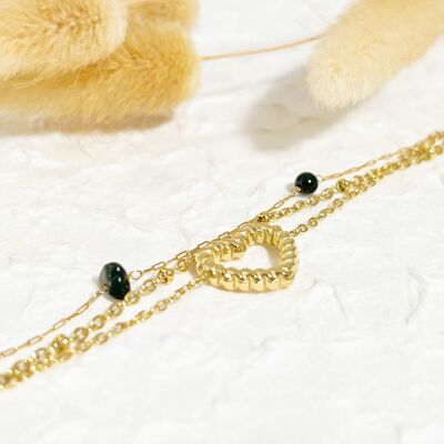 Triple gold chain bracelet with black stones and heart