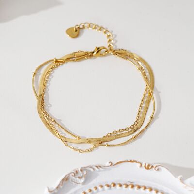 Gold triple chain bracelet