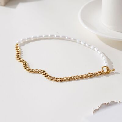 Asymmetrical gold necklace, half pearls, half chain