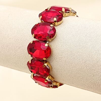 Gold elastic bracelet with red rhinestones