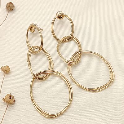 Irregular oval dangling gold earrings