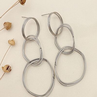 Irregular oval dangling silver earrings