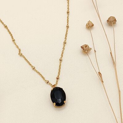 Gold necklace with black rhinestone pendant