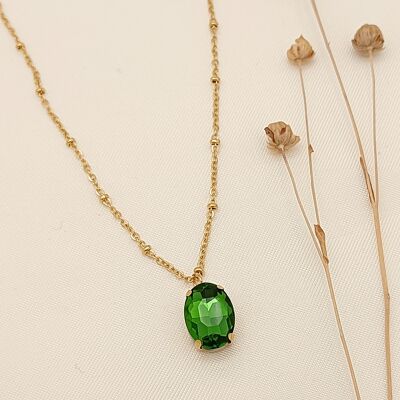 Gold necklace with green rhinestone pendant