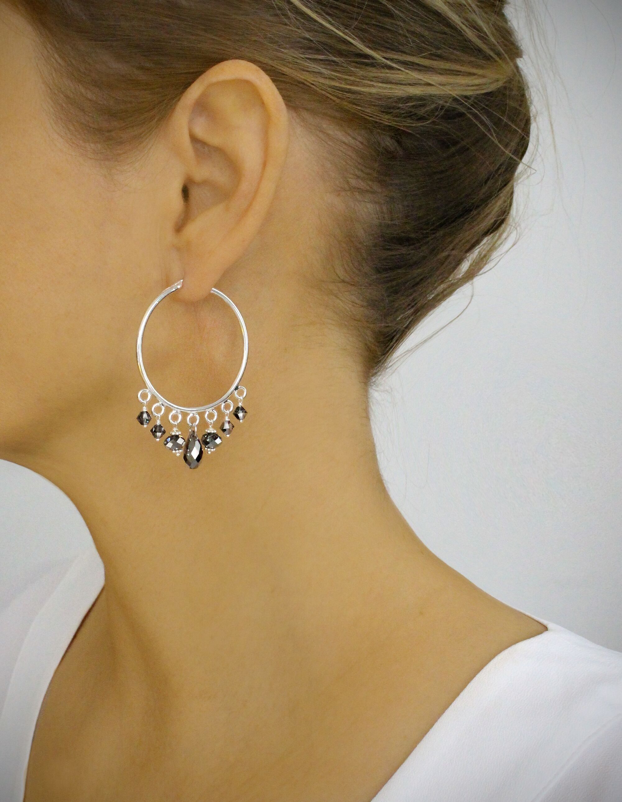 Rhodium plated hoop earrings with Black Diamond crystals