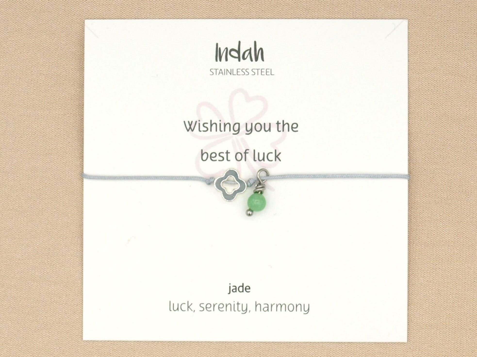 Bracciale roccia, giada, argento e oro