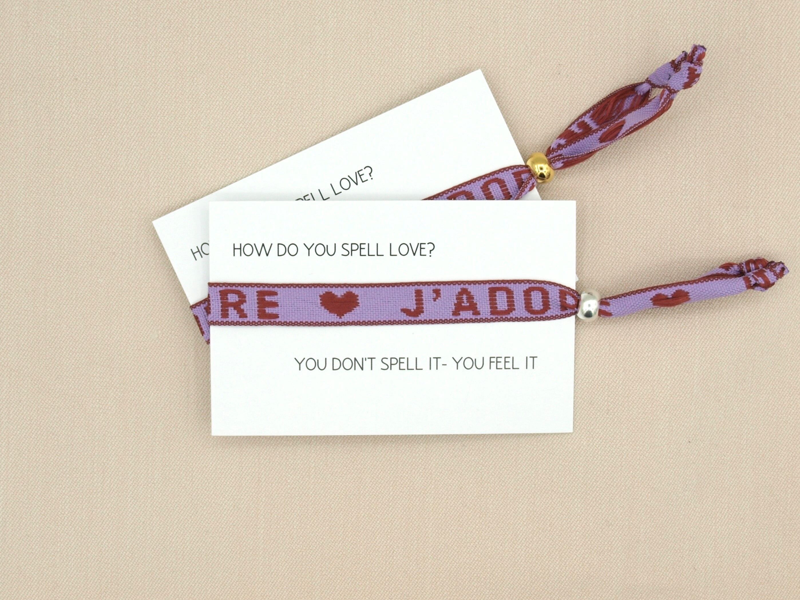 J'adore, braccialetto con nastro viola