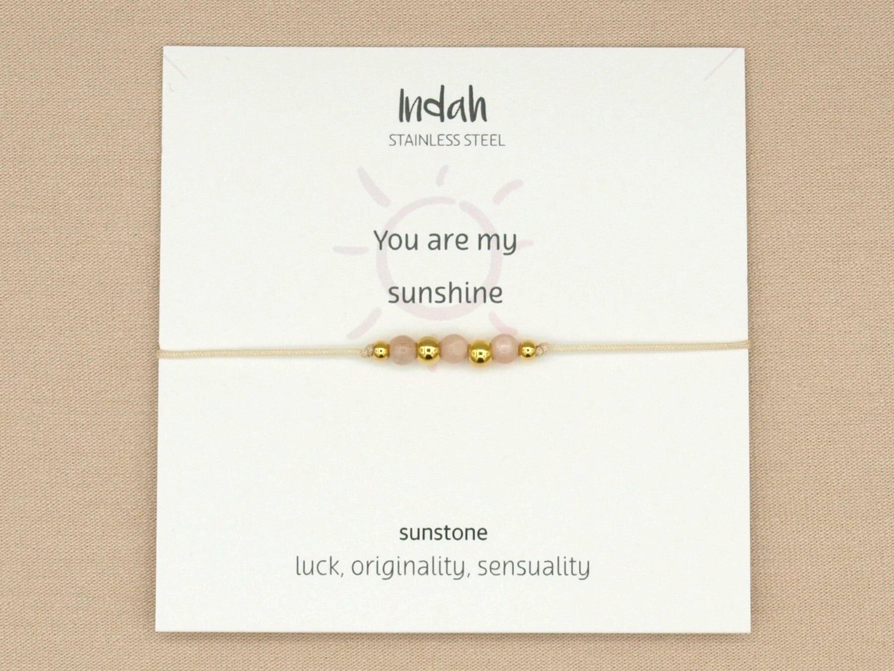 Bracciale roccia, pietra del sole, argento e oro