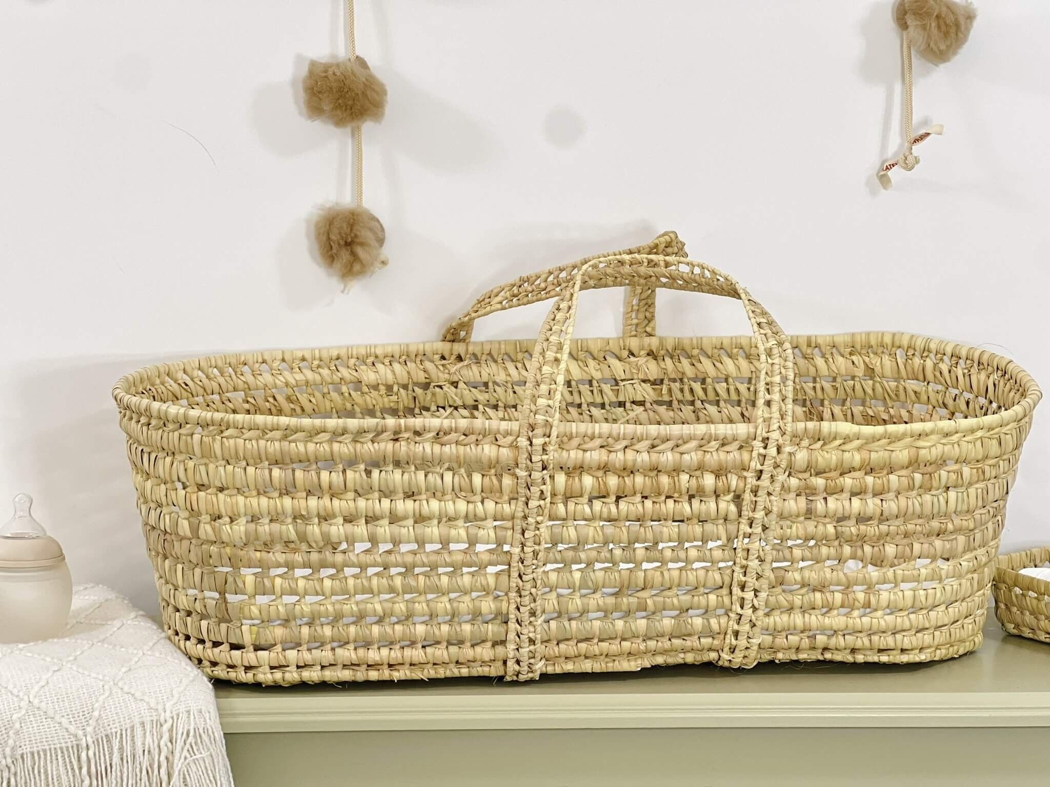 Culla per bambini in foglie di palma intrecciate naturali Eva Babykare