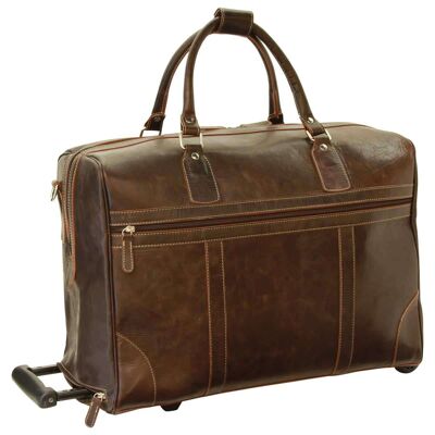 Travel bag in greased calfskin. Dark brown