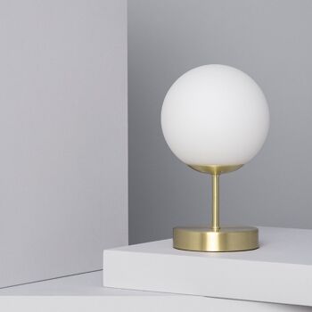Lampe de table Ledkia en métal et cristal clair de lune doré 1
