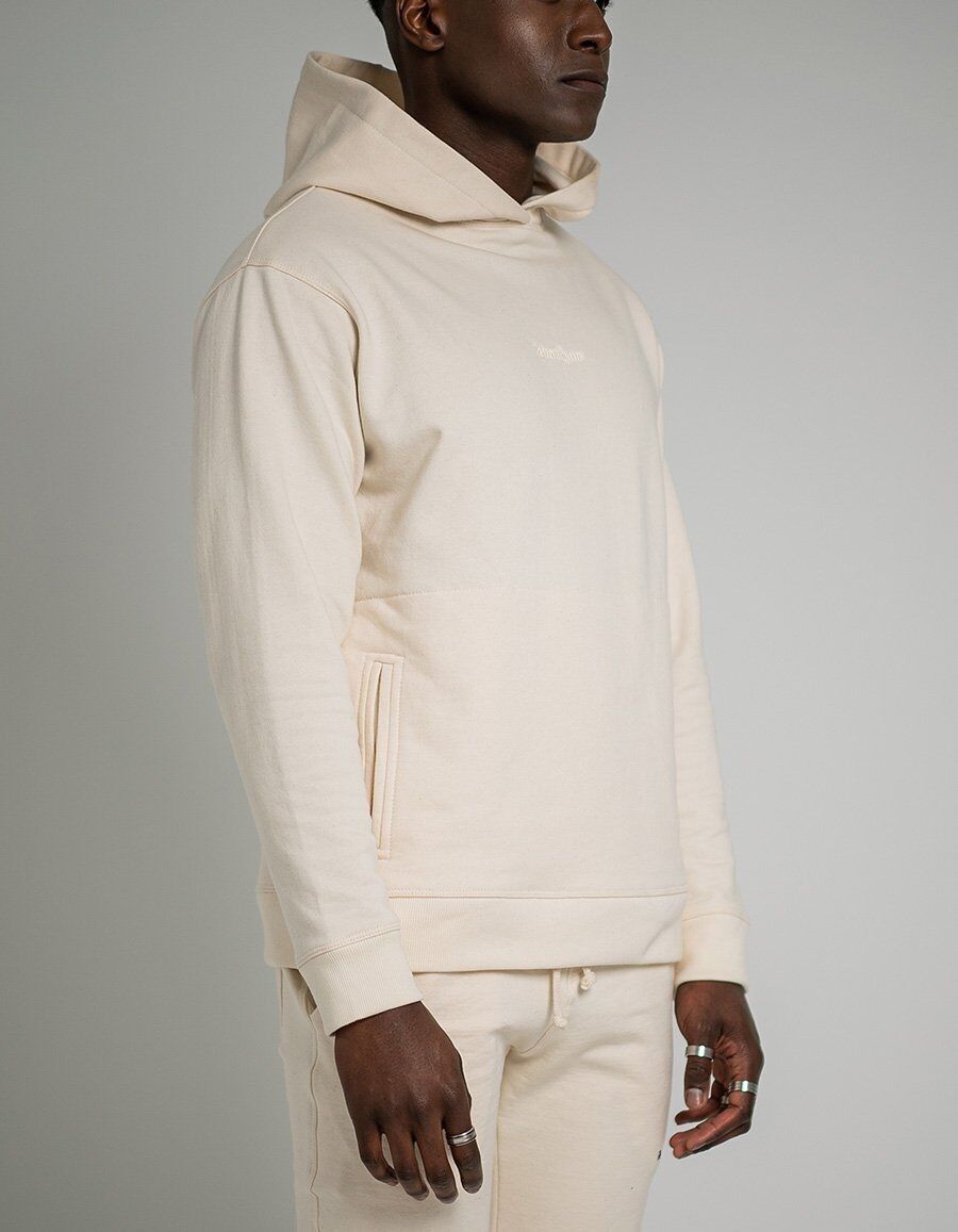 Hellcremefarbener Kapuzenpullover