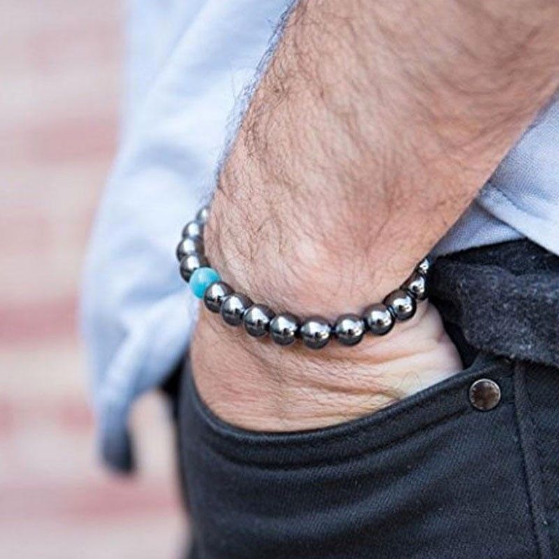 Bracciale dimagrante in ematite con perla di opale blu