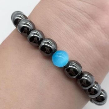 Bracelet minceur hématite avec perle d'Opale bleue 4