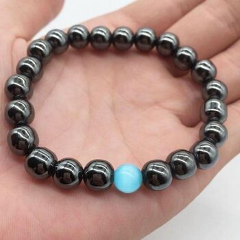 Bracelet minceur hématite avec perle d'Opale bleue 5