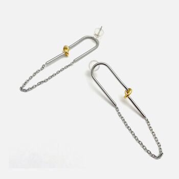 Boucles d'oreilles en argent avec un noeud doré 2