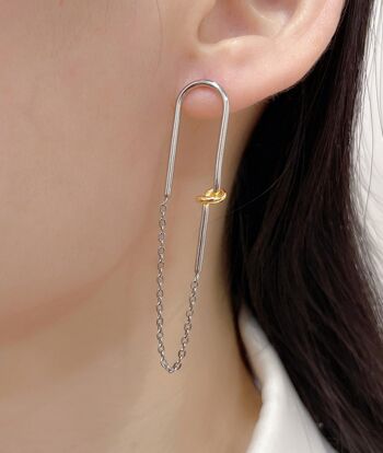 Boucles d'oreilles en argent avec un noeud doré 3