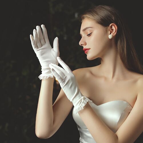 Sophisticated Minimalist white bridal gloves with lace trims
