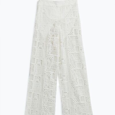 Pantaloni bianchi con gamba larga all'uncinetto