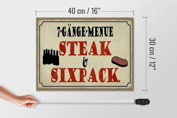 Panneau en bois indiquant 40x30cm, menu à 7 plats, steak, six pack, panneau de grill 4