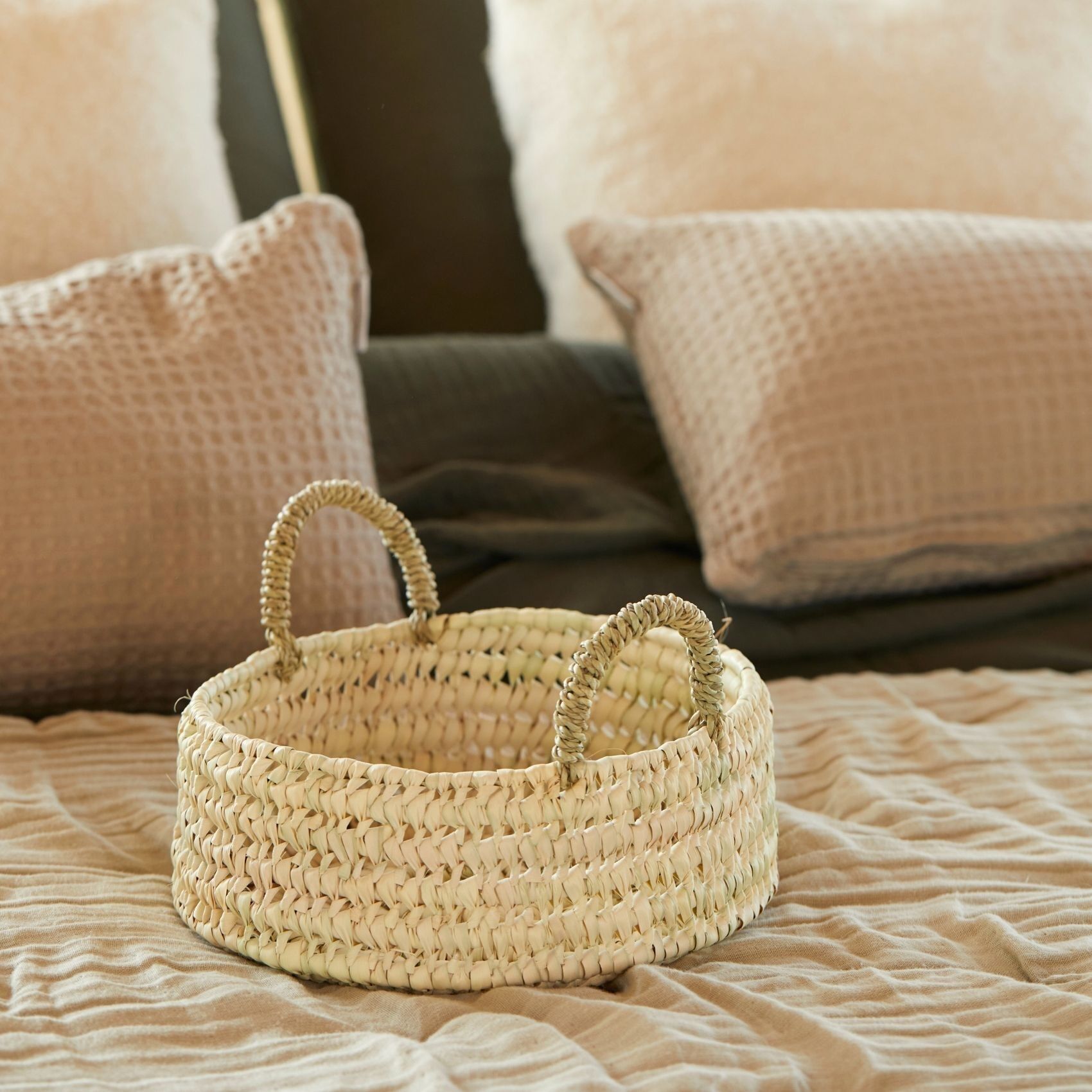 Vassoio rotondo in vimini con manici