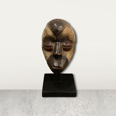 Small African mask on stand