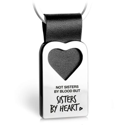 Llavero corazón con grabado "No hermanas de sangre sino hermanas de corazón" fabricado en cuero