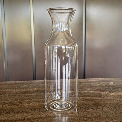 Botella de vidrio con tapa