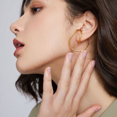 Ear cuff dalla linea fluida geometrica 3D, pezzo unico, oro e argento